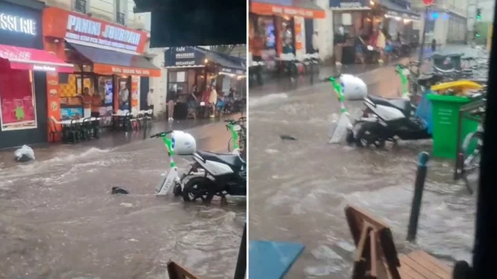 Paris street submerged by water as heavy rain hits French capital