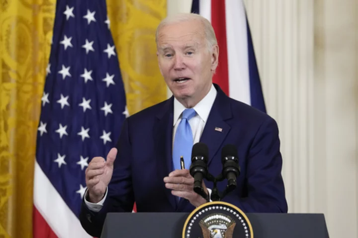 Biden heads to North Carolina to push clean energy agenda and promote order aiding military spouses